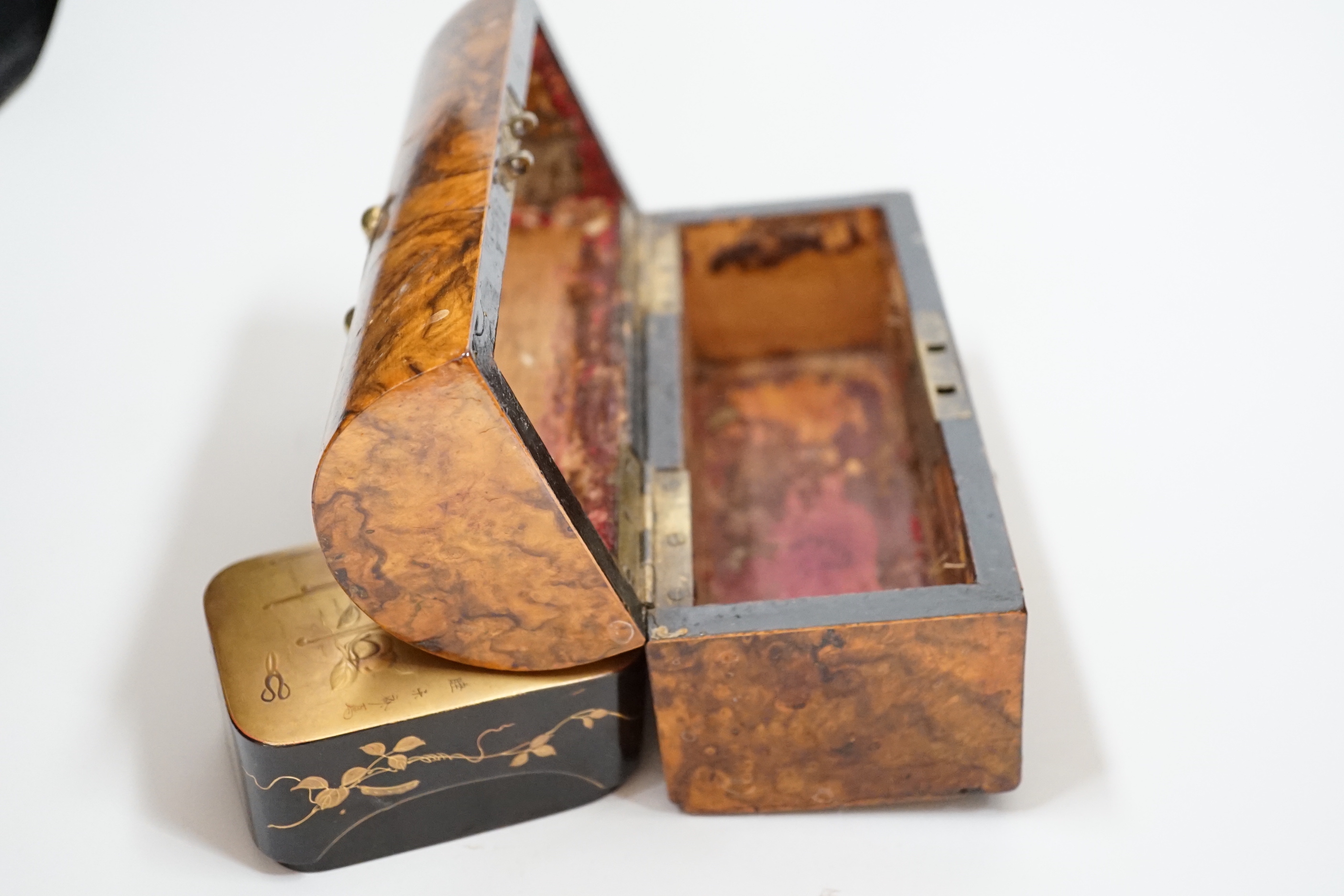 A walnut and brass-studded casket, 19.5cm wide, and a small lacquered box